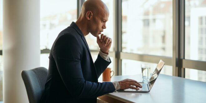 man using laptop